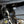 Load image into Gallery viewer, J&amp;L 13-19 Ford Explorer Sport EcoBoost V6 Passenger Side Oil Separator 3.0 - Black Anodized
